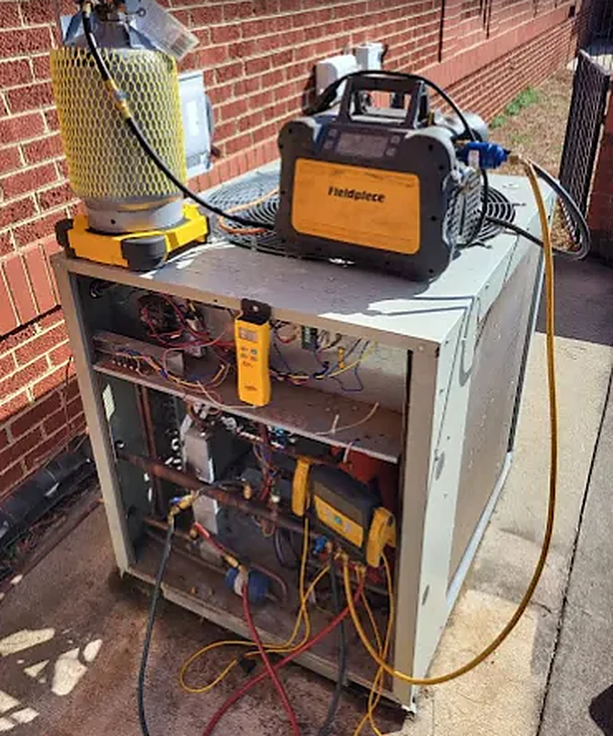Refrigerant recovery during a commercial AC repair